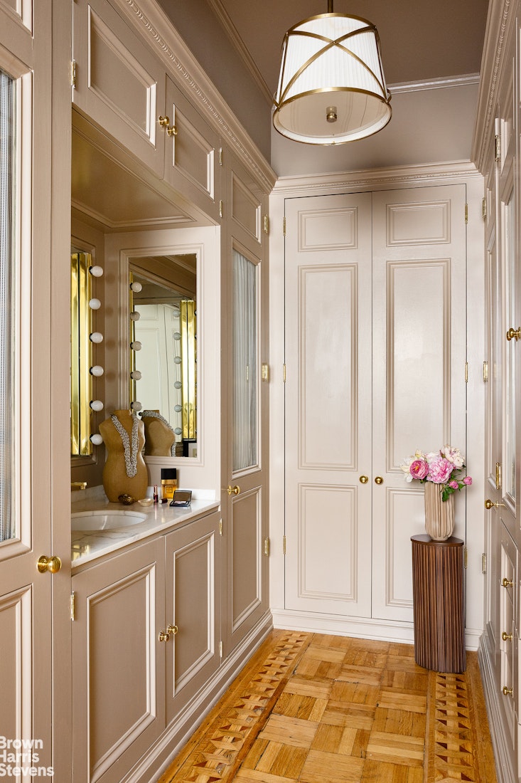 57 East 74th Street Manhattan, NY 10021 - Photo 19 of 60 a view of a hallway and a livingroom with furniture