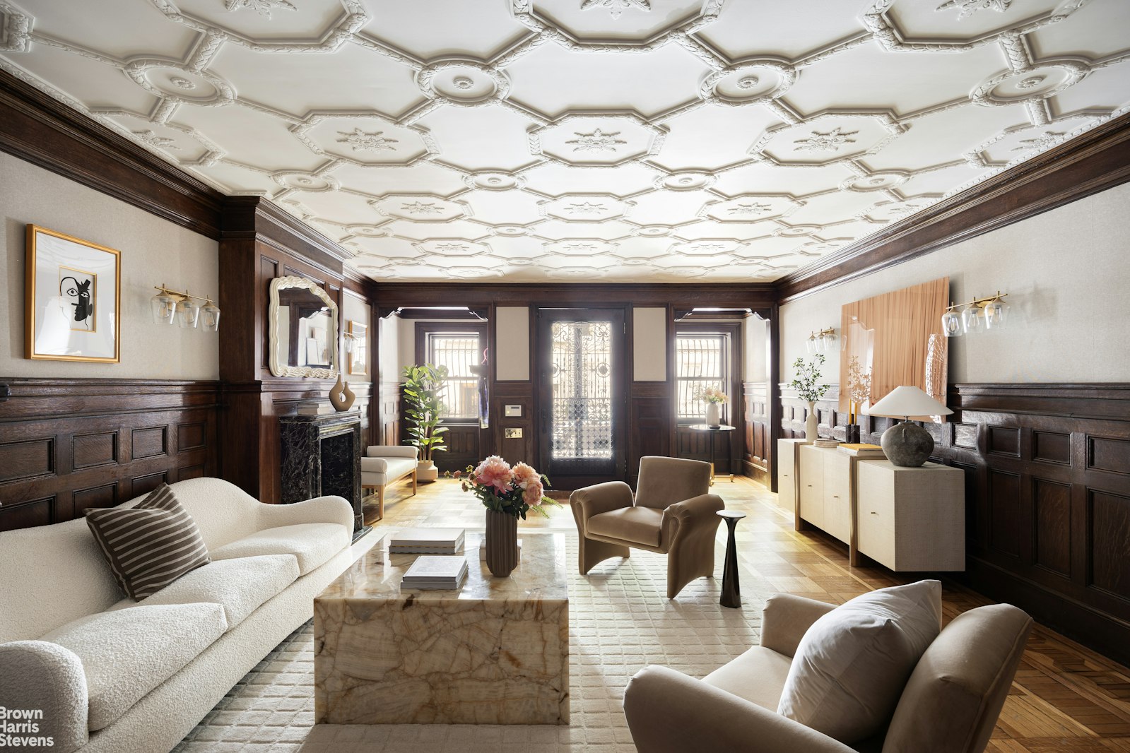 57 East 74th Street Manhattan, NY 10021 - Photo 21 of 60 a living room with furniture and a large window