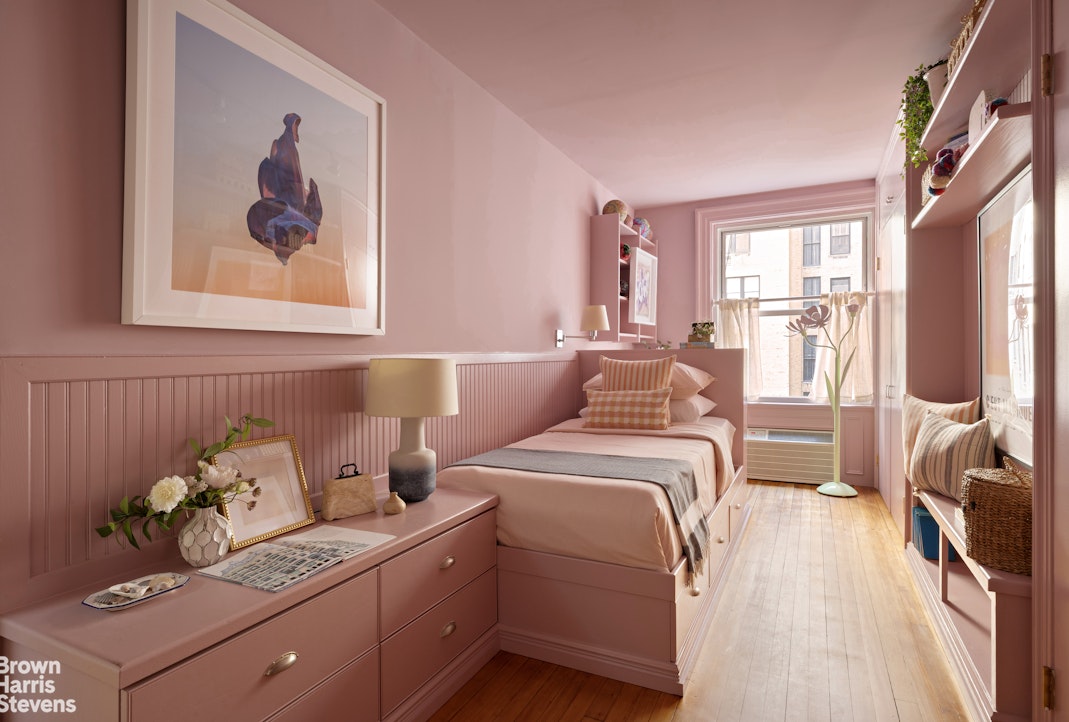 57 East 74th Street Manhattan, NY 10021 - Photo 24 of 60 a bed room with a bed and a painting on the wall