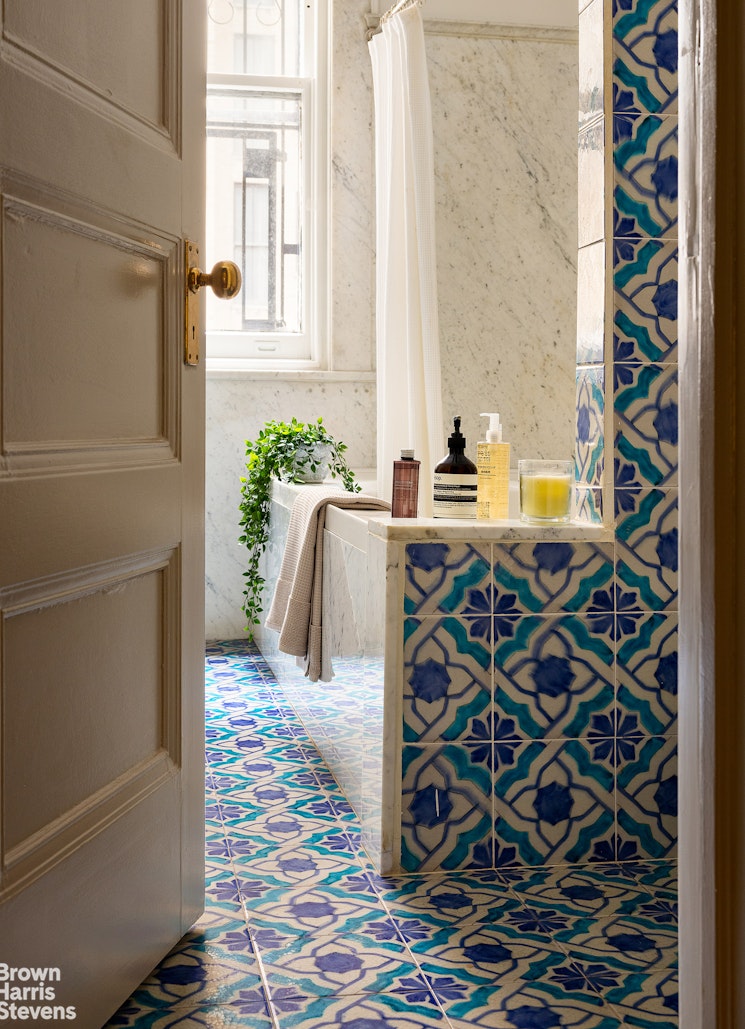 57 East 74th Street Manhattan, NY 10021 - Photo 28 of 60 a bathroom with a bathtub and shower