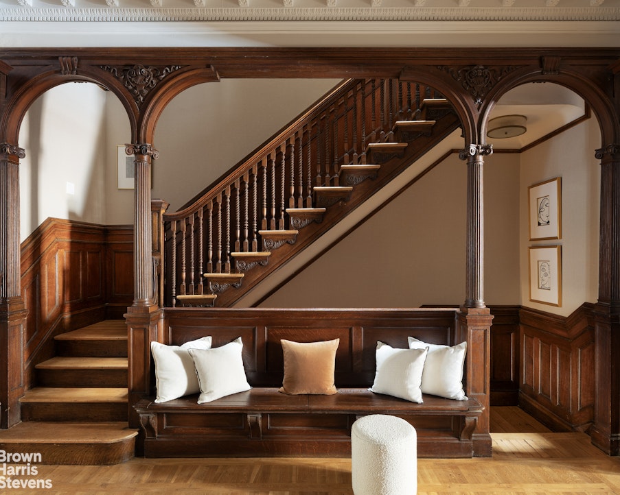 57 East 74th Street Manhattan, NY 10021 - Photo 2 of 60 a front view of a house with wooden floor and windows