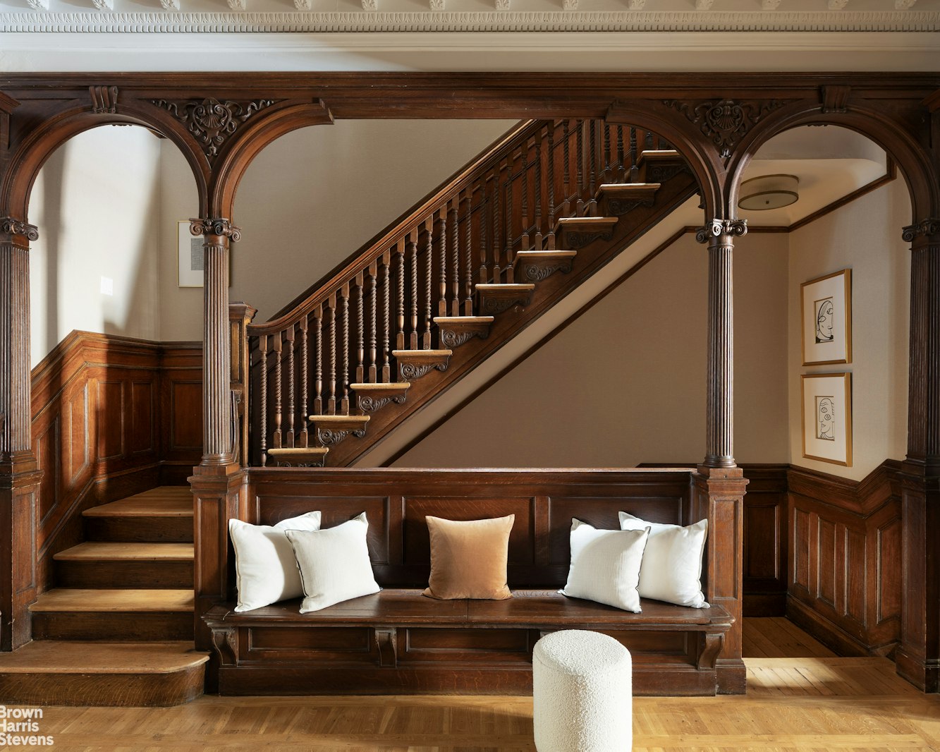 57 East 74th Street Manhattan, NY 10021 - Photo 34 of 60 a front view of a house with wooden floor and a potted plant