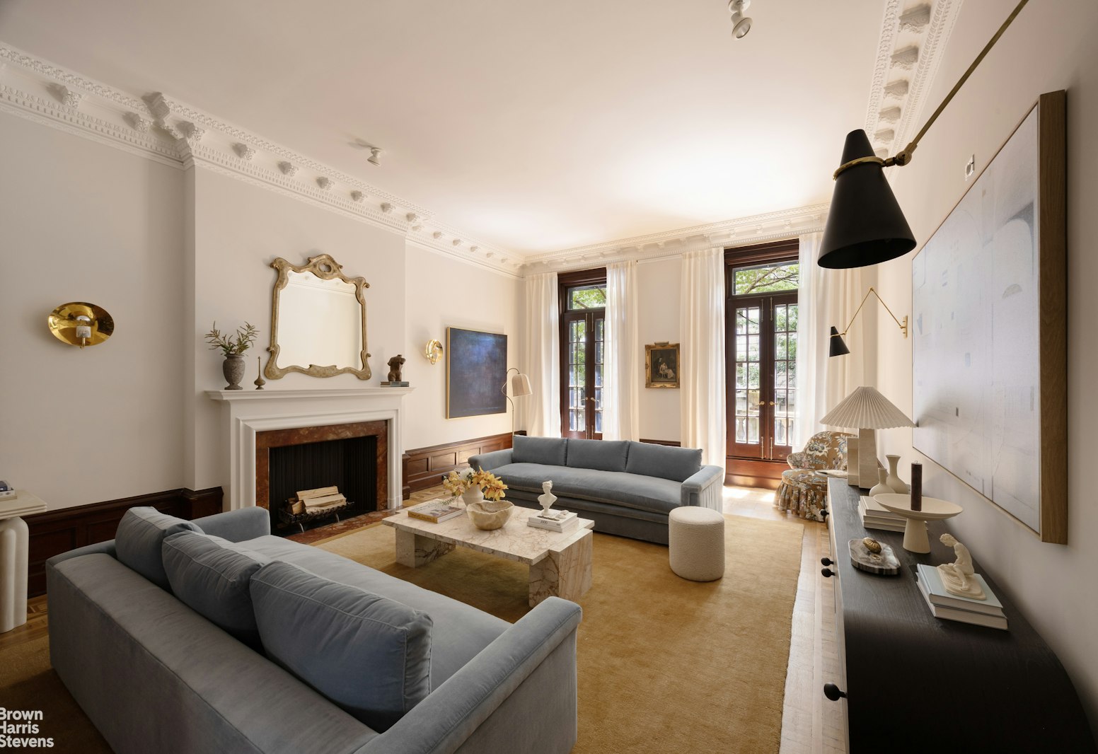 57 East 74th Street Manhattan, NY 10021 - Photo 35 of 60 a living room with furniture and a fireplace