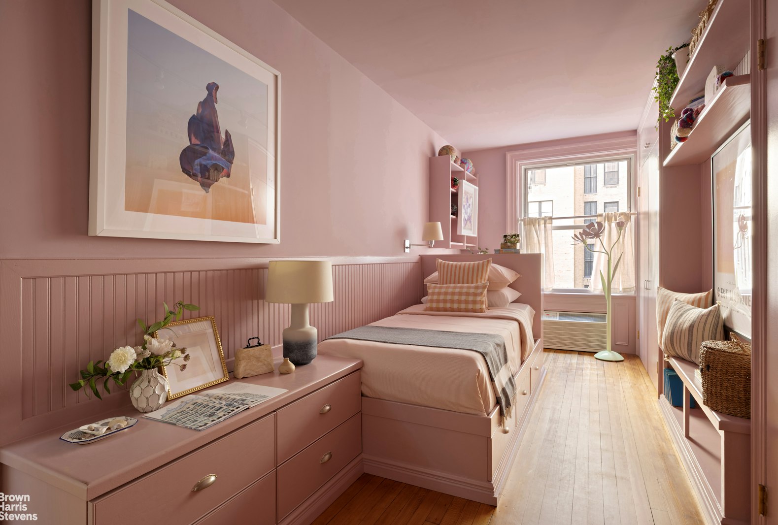 57 East 74th Street Manhattan, NY 10021 - Photo 50 of 60 a bed room with a bed and a painting on the wall