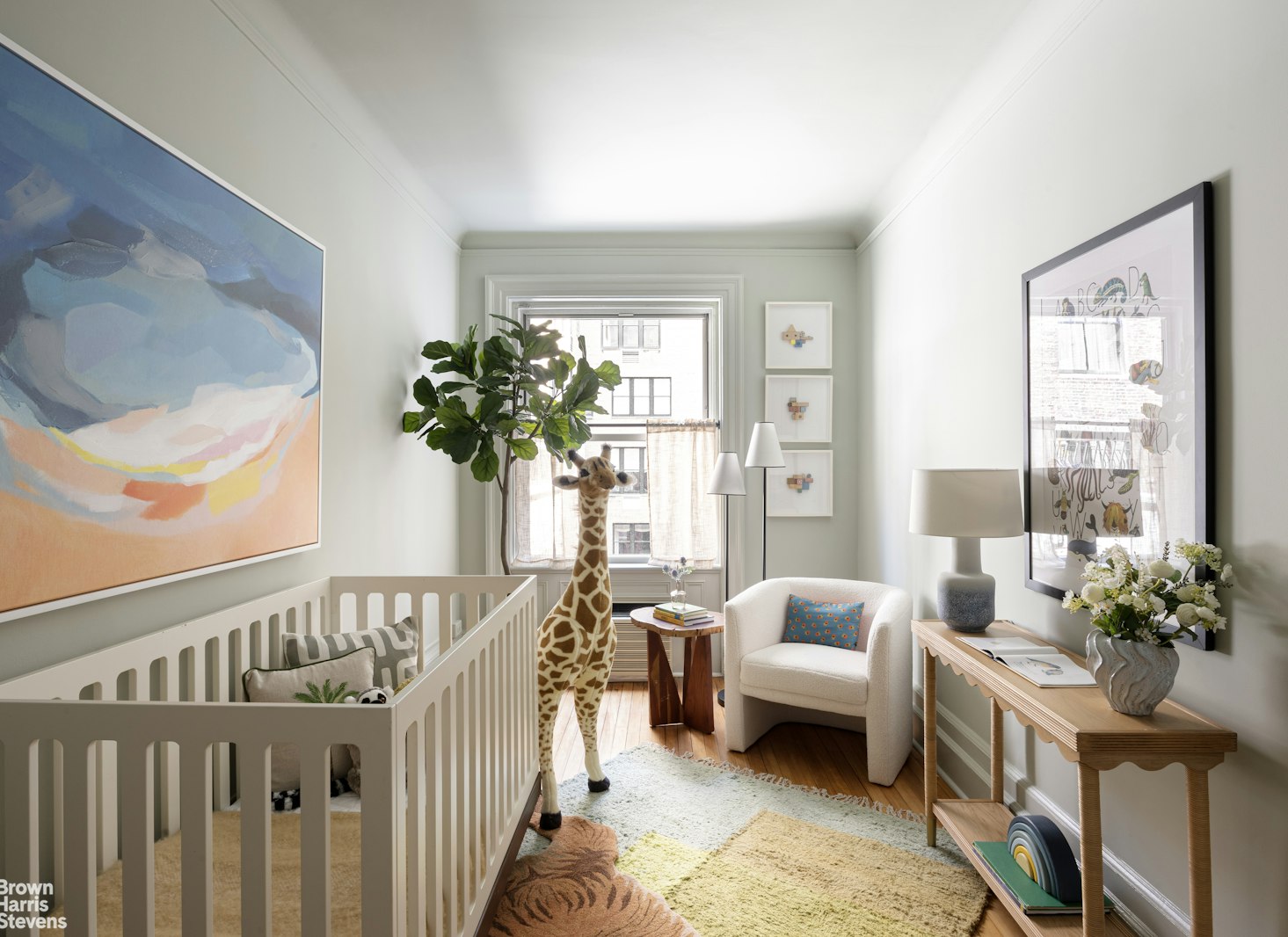57 East 74th Street Manhattan, NY 10021 - Photo 52 of 60 a living room with furniture and a large window