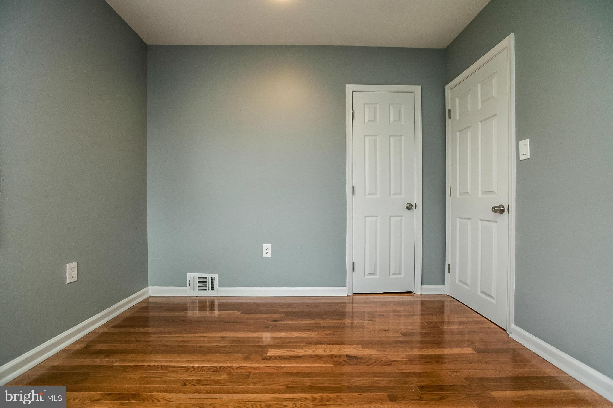 3534 Milford Mill Road Baltimore, MD 21244 - Photo 20 of 30 a view of a room with wooden floor