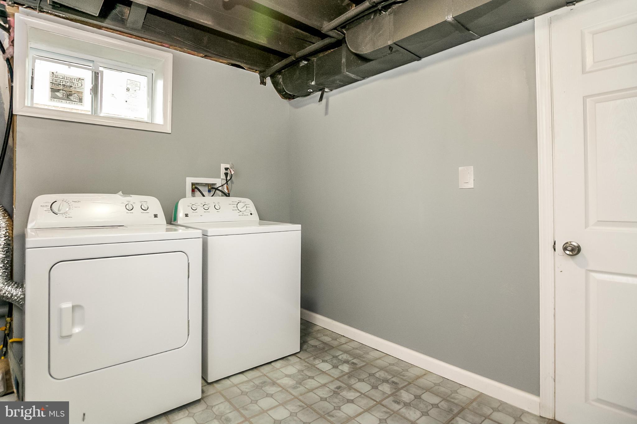3534 Milford Mill Road Baltimore, MD 21244 - Photo 21 of 30 a utility room with dryer and washer