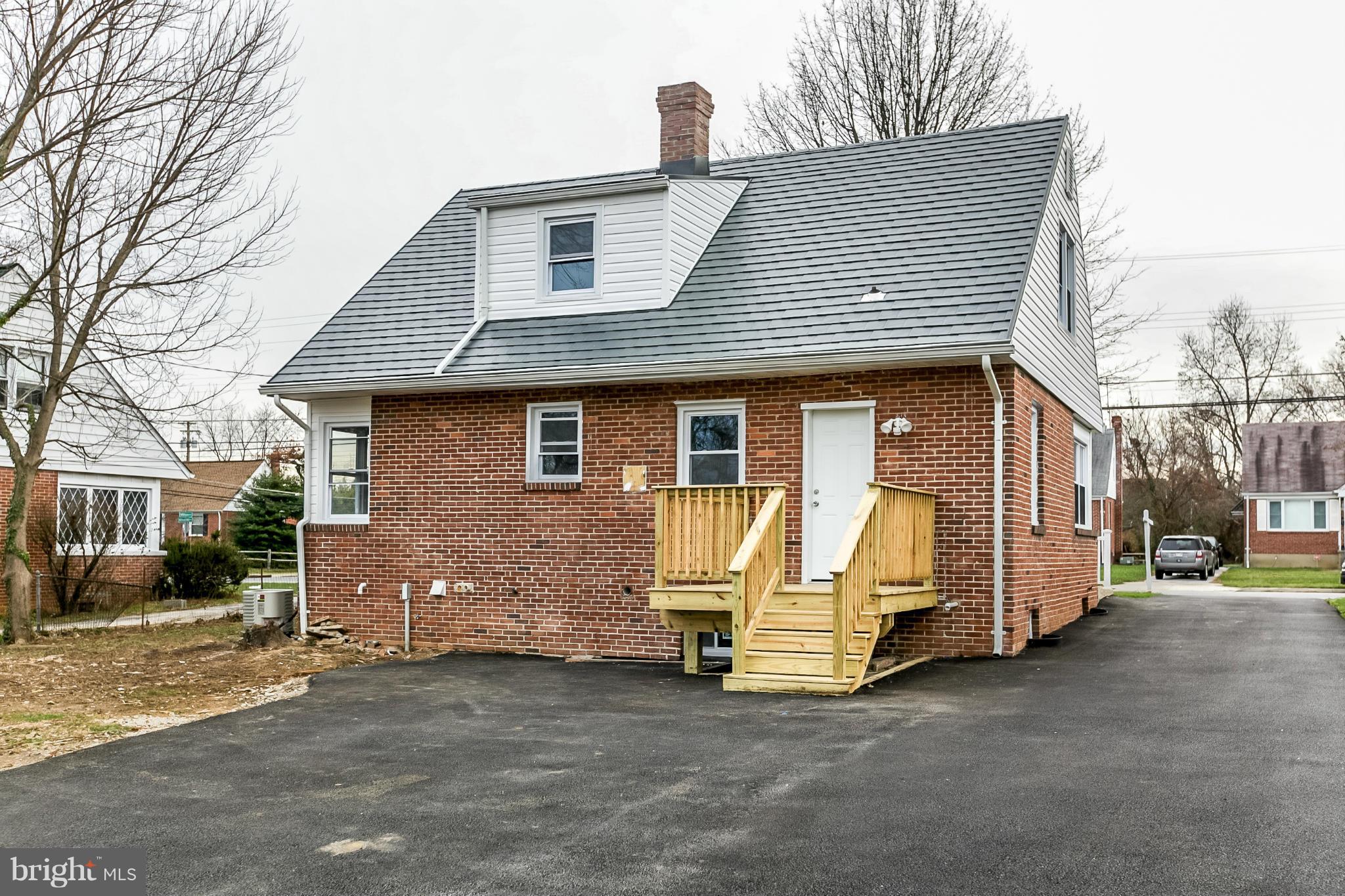 3534 Milford Mill Road Baltimore, MD 21244 - Photo 25 of 30 a view of a house with a yard