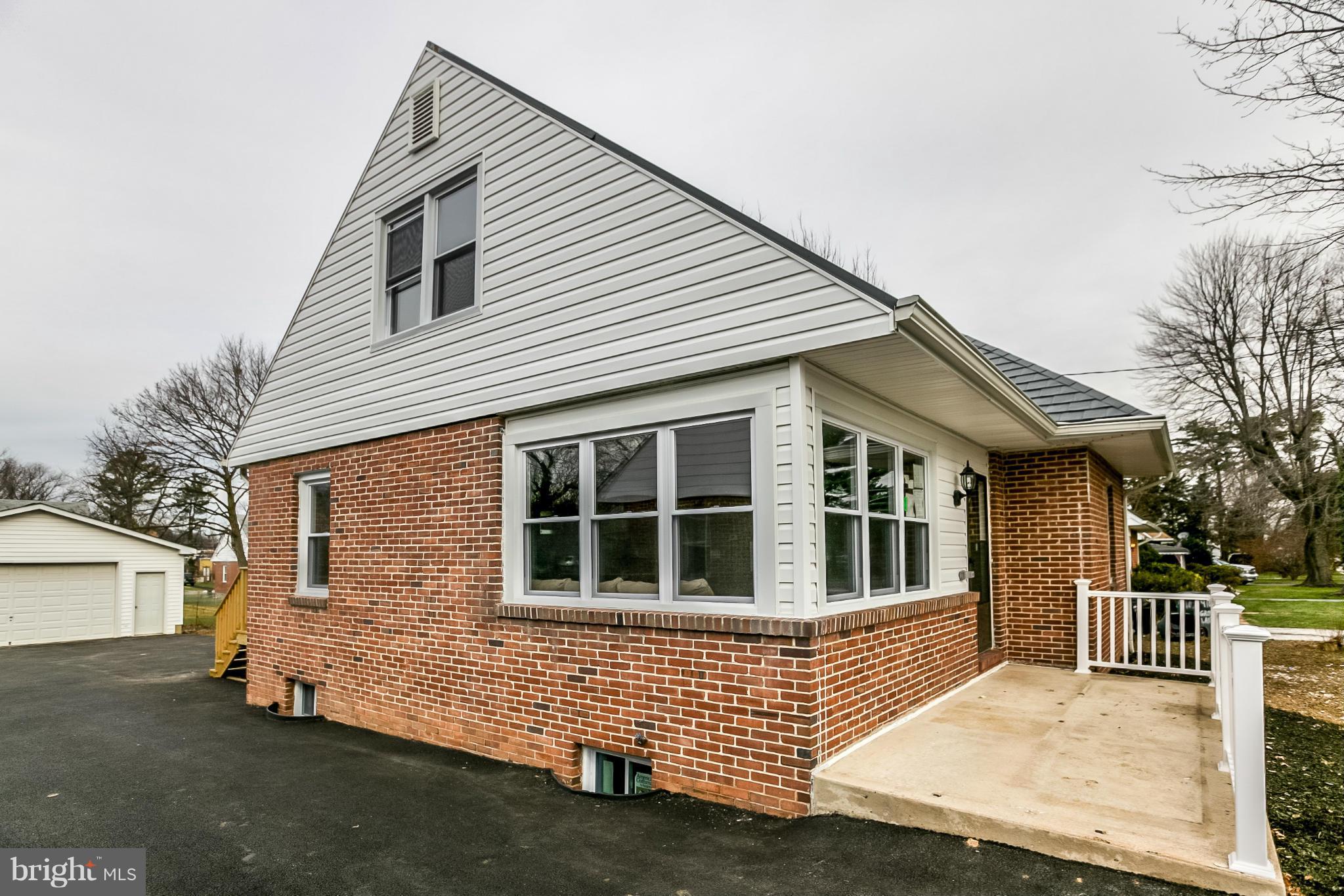 3534 Milford Mill Road Baltimore, MD 21244 - Photo 27 of 30 a front view of a house with windows