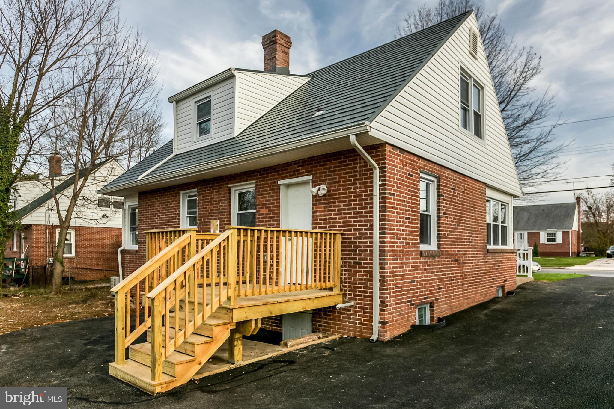 3534 Milford Mill Road Baltimore, MD 21244 - Photo 6 of 30 a view of a house with a yard
