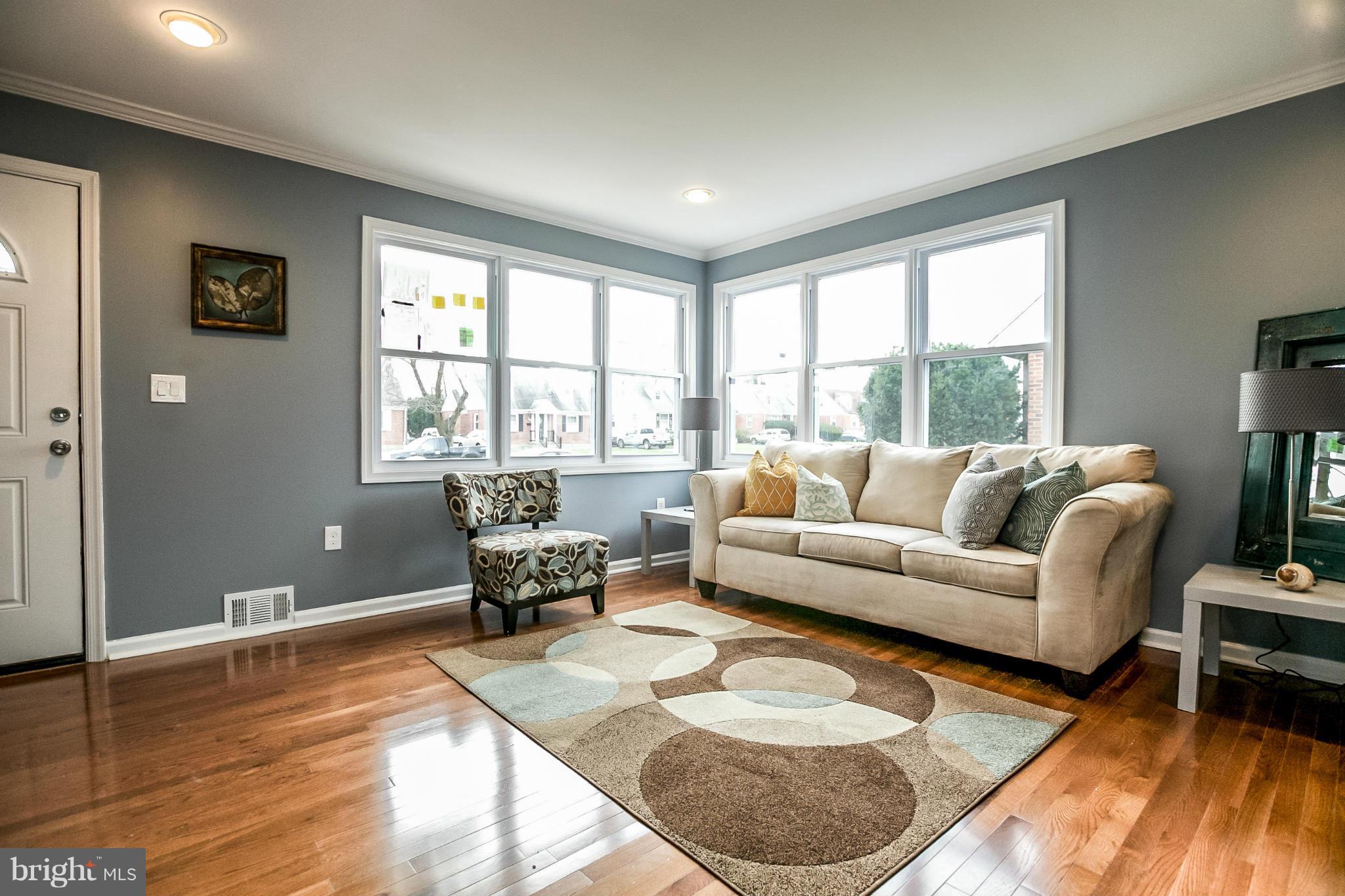 3534 Milford Mill Road Baltimore, MD 21244 - Photo 8 of 30 a living room with furniture and a large window
