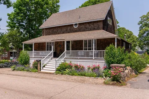 front view of a house with a small yard