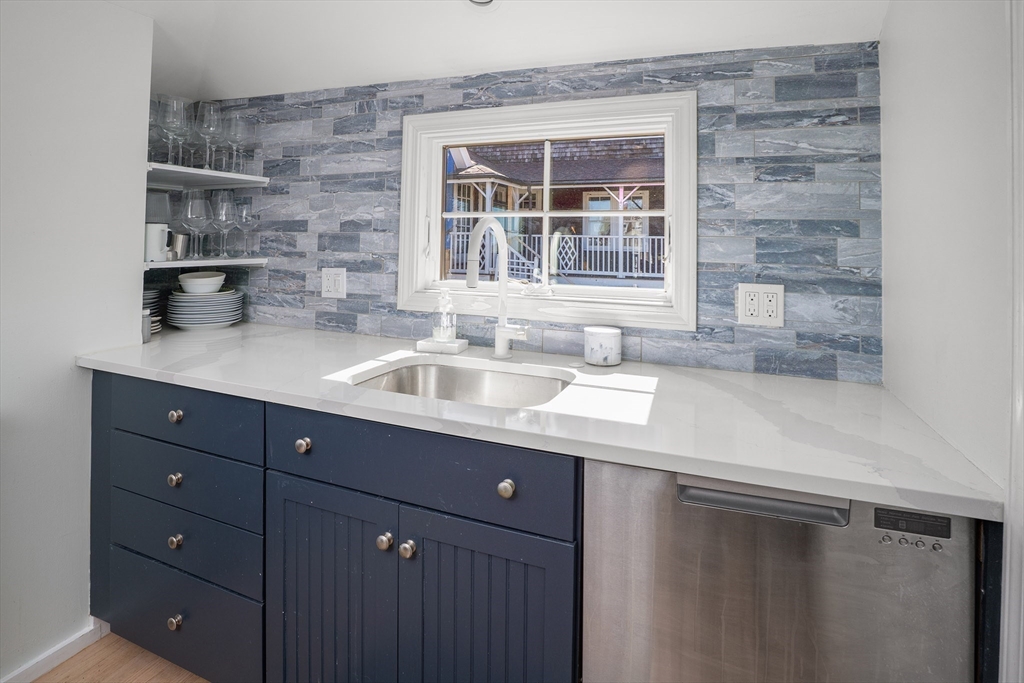 19 Old Garden Road Rockport, MA 01966 - Photo 14 of 42 a kitchen with a sink and a window