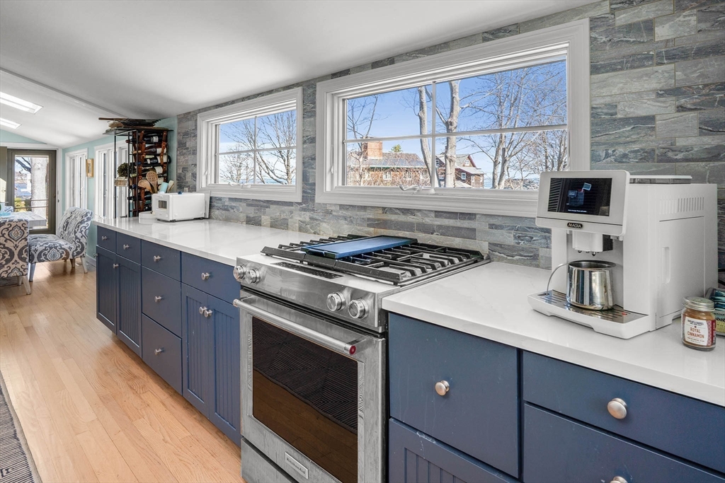 19 Old Garden Road Rockport, MA 01966 - Photo 15 of 42 a kitchen with a stove and a sink
