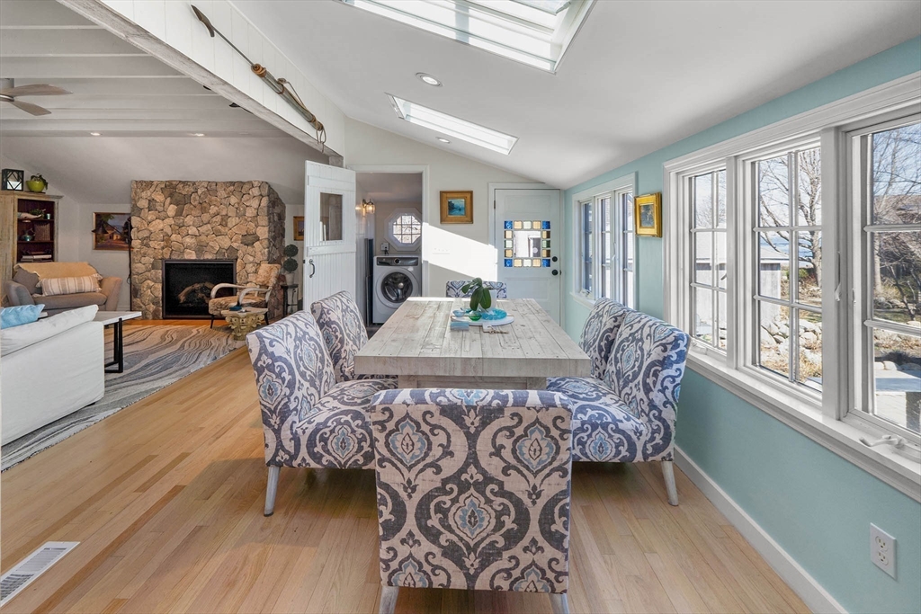 19 Old Garden Road Rockport, MA 01966 - Photo 17 of 42 a view of a dining room with furniture window and wooden floor