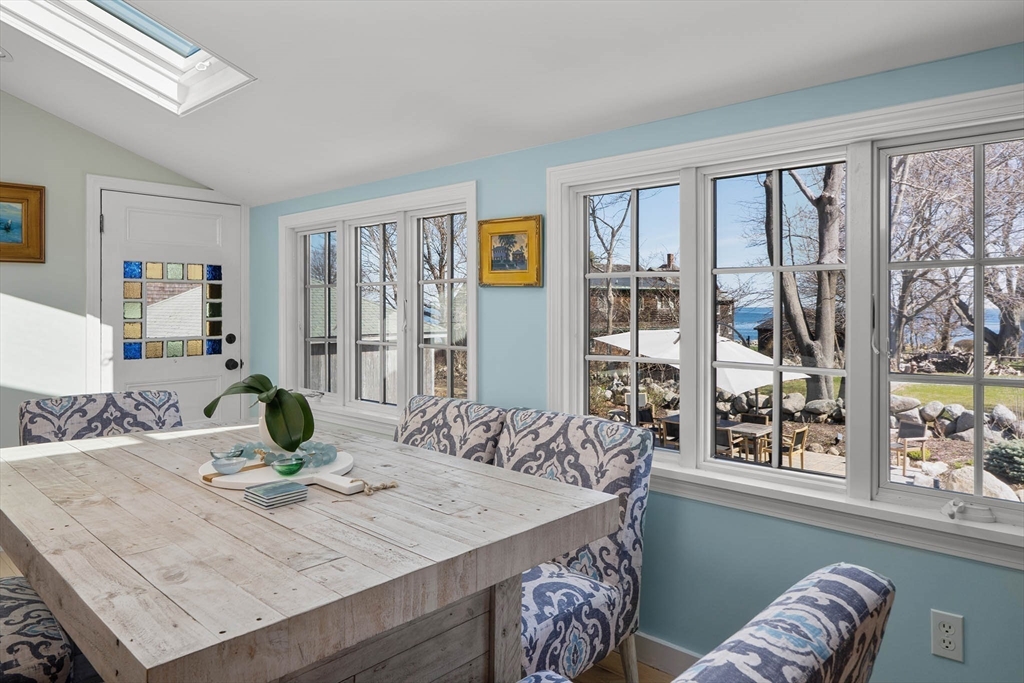 19 Old Garden Road Rockport, MA 01966 - Photo 19 of 42 a view of a dining room with furniture window and outside view