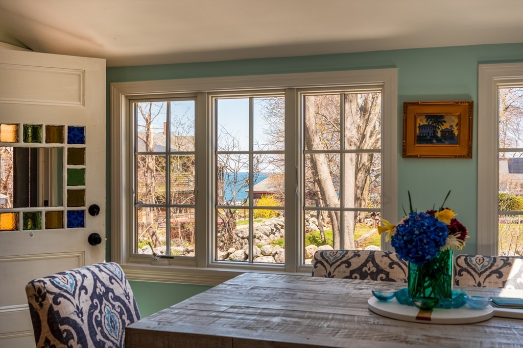 19 Old Garden Road Rockport, MA 01966 - Photo 22 of 42 a living room filled with furniture and a potted plant