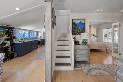 a bedroom with a bed and furniture