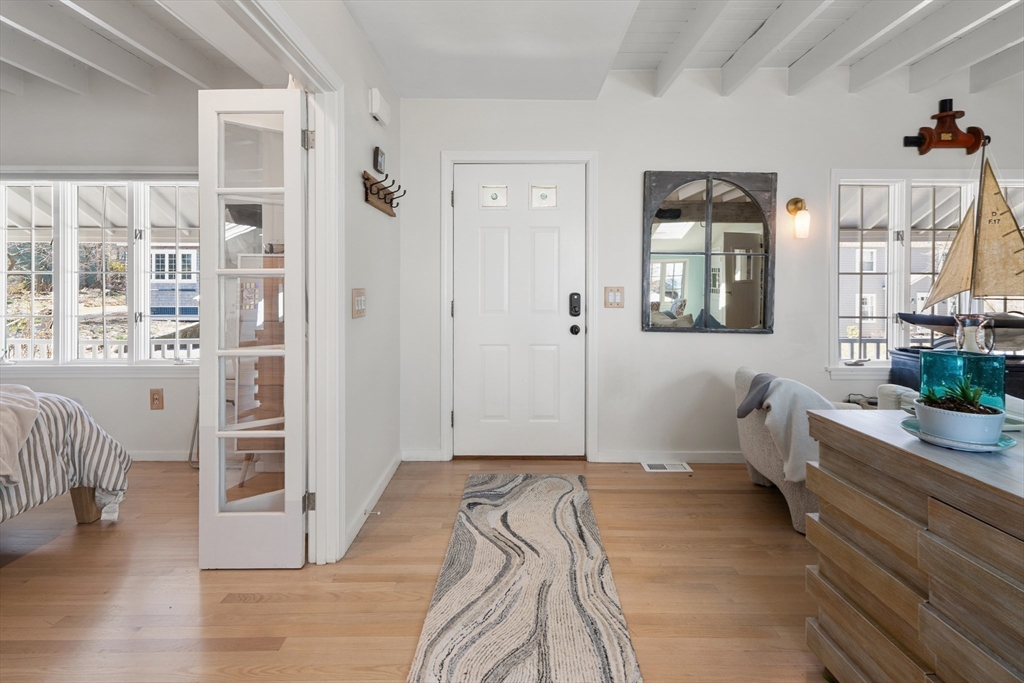 19 Old Garden Road Rockport, MA 01966 - Photo 25 of 42 a bedroom with a bed and a window