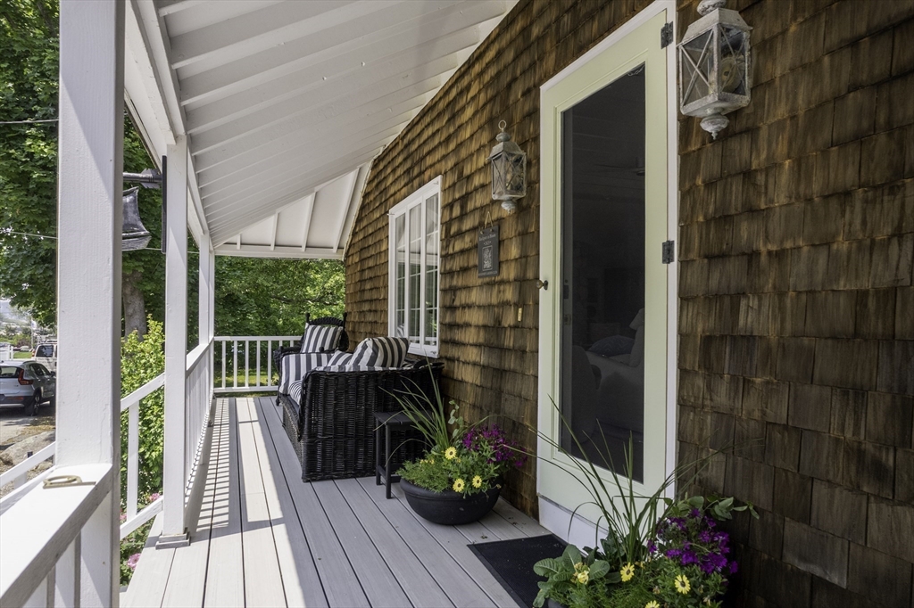 19 Old Garden Road Rockport, MA 01966 - Photo 35 of 42 a view of a balcony with wooden floor
