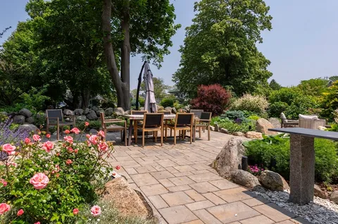 a view of a tables and chairs in patio