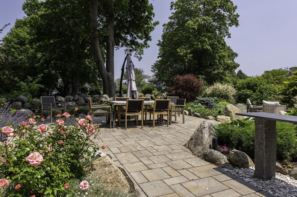 19 Old Garden Road Rockport, MA 01966 - Photo 39 of 42 a view of a tables and chairs in patio