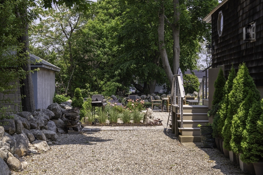 19 Old Garden Road Rockport, MA 01966 - Photo 40 of 42 a couple of potted plants in front of a house