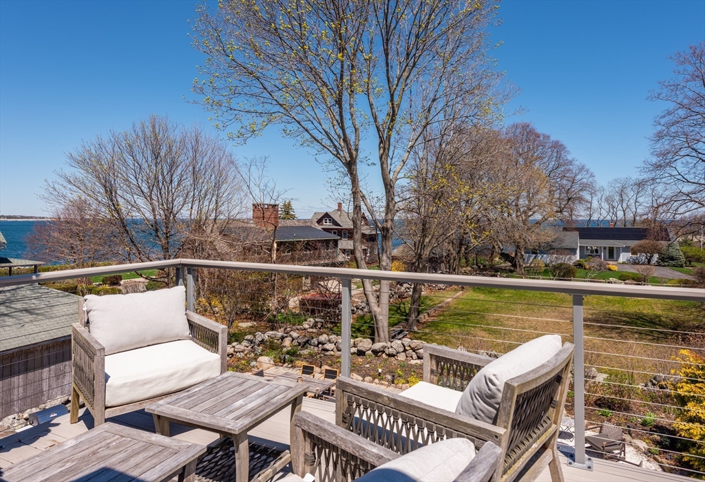 19 Old Garden Road Rockport, MA 01966 - Photo 41 of 42 a view of a chairs and table on the terrace