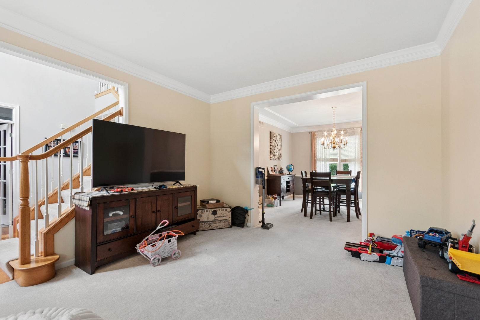 3744 Highknob Circle Naperville, IL 60564 - Photo 2 of 20 a living room with furniture and a flat screen tv