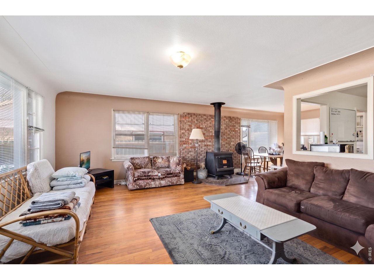 821 West Mulberry Street Fort Collins, CO 80521 - Photo 1 of 13 a living room with furniture and a large window