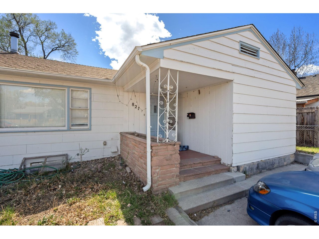 821 West Mulberry Street Fort Collins, CO 80521 - Photo 2 of 13 a front view of a house with garden