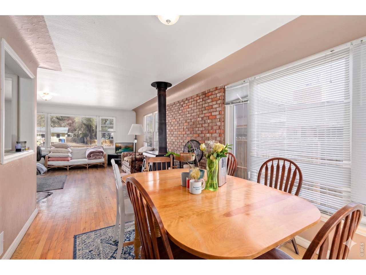 821 West Mulberry Street Fort Collins, CO 80521 - Photo 5 of 13 a dining room with furniture and a large window