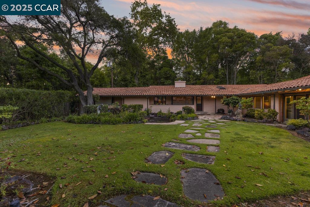 940 Reliez Station Lane Lafayette, CA 94549 - Photo 25 of 53 a front view of a house with garden