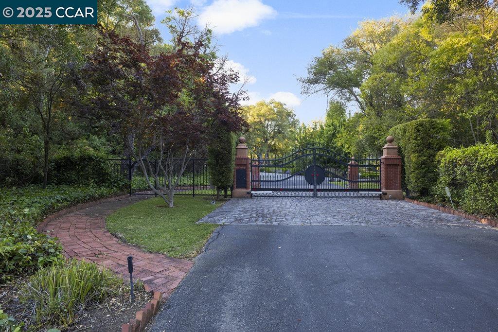 940 Reliez Station Lane Lafayette, CA 94549 - Photo 9 of 53 a view of a street with large trees