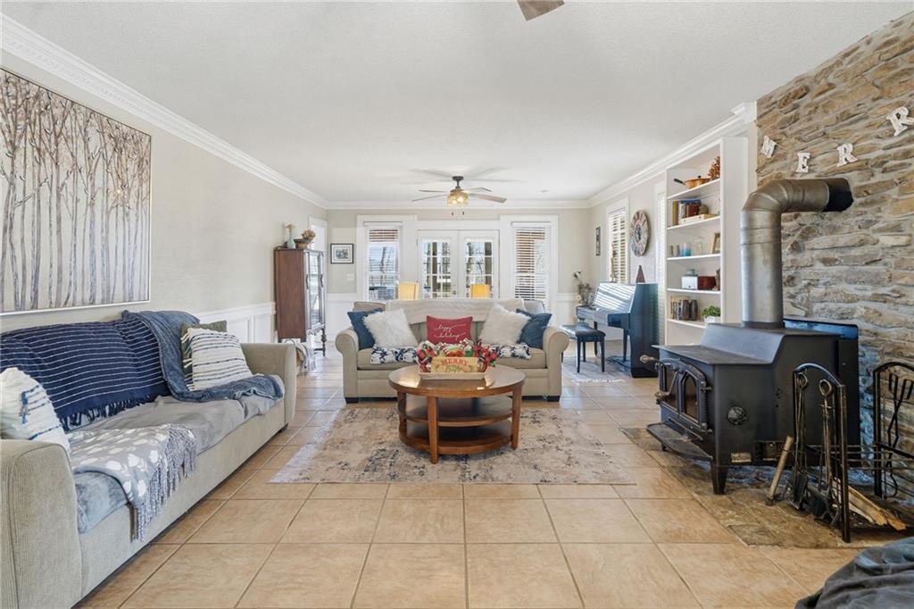 1008 River Estates Road Cleveland, GA 30528 - Photo 12 of 37 a living room with furniture and large windows