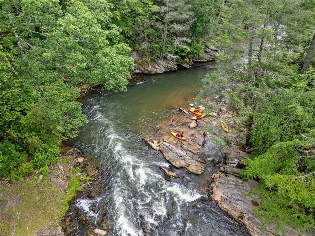 1008 River Estates Road Cleveland, GA 30528 - Photo 4 of 37 a view of a lake with green space
