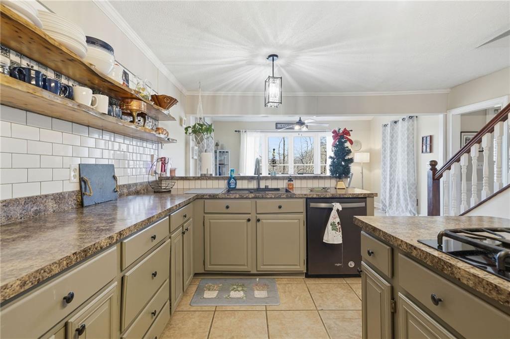 1008 River Estates Road Cleveland, GA 30528 - Photo 7 of 37 a kitchen with a sink and cabinets