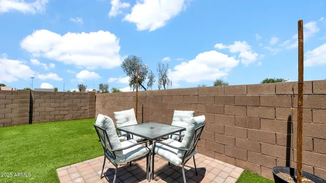 a childrens park with lots of swings and slides