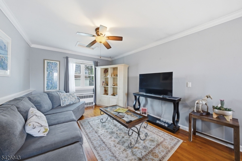 7 Valley Road Randolph, NJ 07869 - Photo 12 of 47 a living room with furniture and a flat screen tv