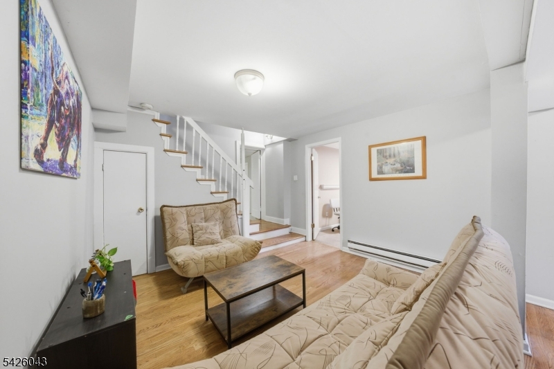 7 Valley Road Randolph, NJ 07869 - Photo 19 of 47 a living room with furniture and wooden floor