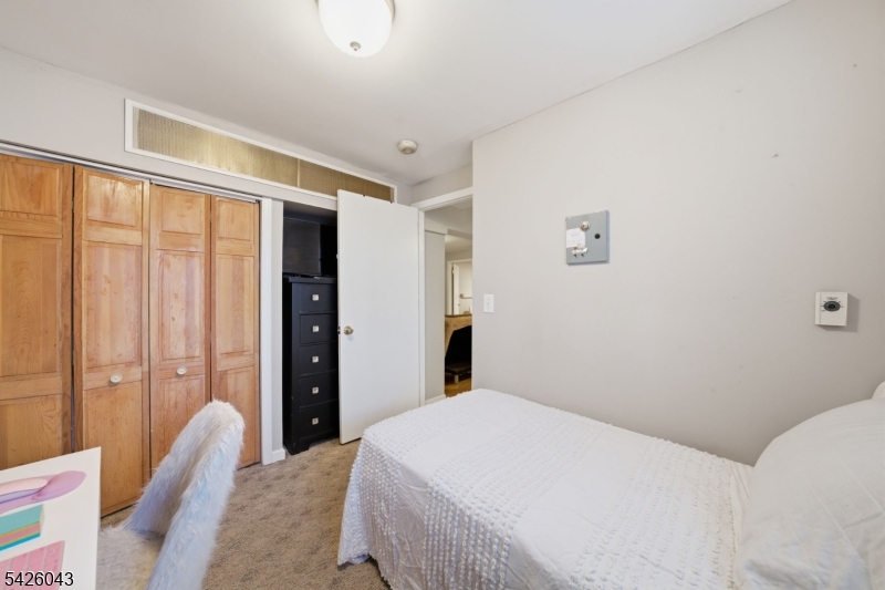 7 Valley Road Randolph, NJ 07869 - Photo 22 of 47 a bedroom with a large bed and a window