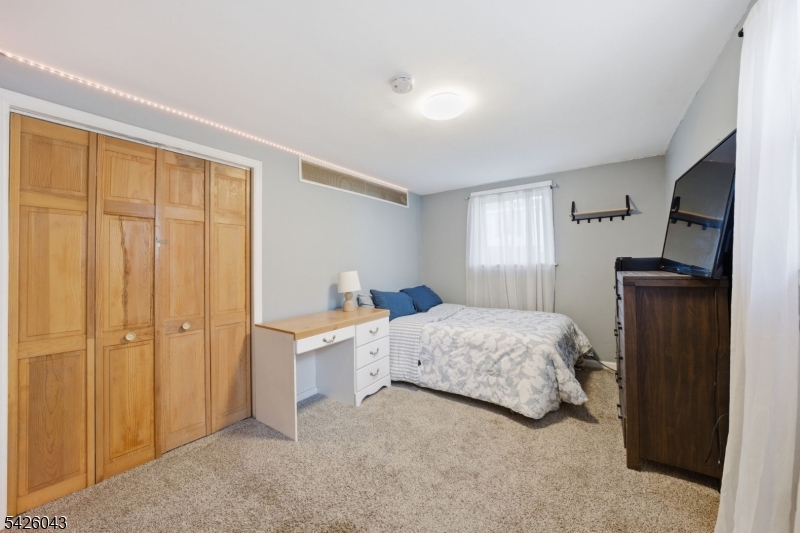 7 Valley Road Randolph, NJ 07869 - Photo 23 of 47 a bedroom with a bed and a window