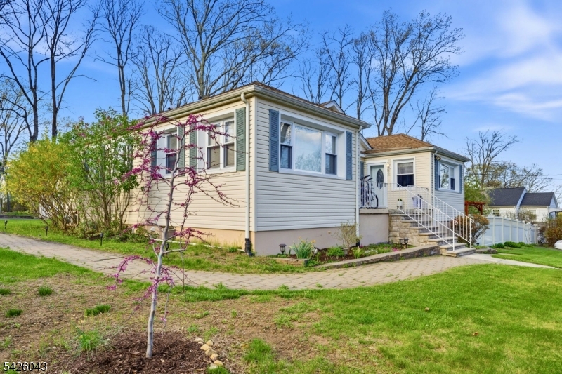 7 Valley Road Randolph, NJ 07869 - Photo 3 of 47 a front view of a house with garden