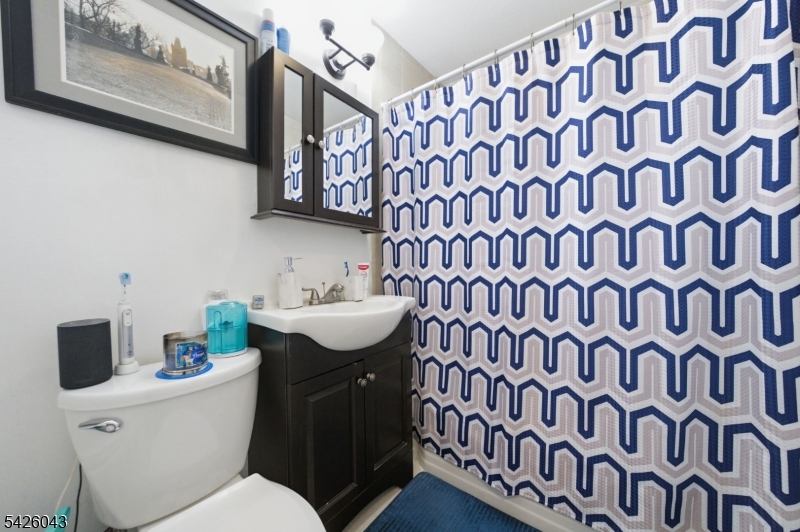 7 Valley Road Randolph, NJ 07869 - Photo 35 of 47 a bathroom with a sink and a mirror