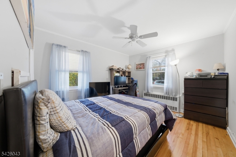 7 Valley Road Randolph, NJ 07869 - Photo 37 of 47 a bedroom with a bed and wooden floor