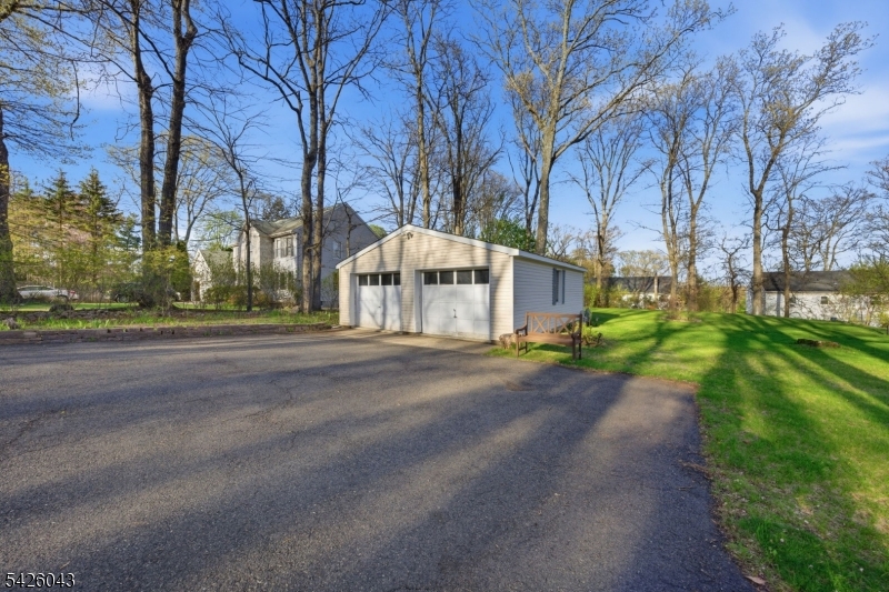 7 Valley Road Randolph, NJ 07869 - Photo 39 of 47 a front view of a house with a yard and pathway