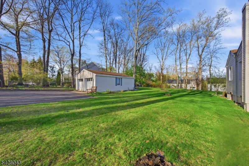 7 Valley Road Randolph, NJ 07869 - Photo 40 of 47 a front view of a house with garden and trees