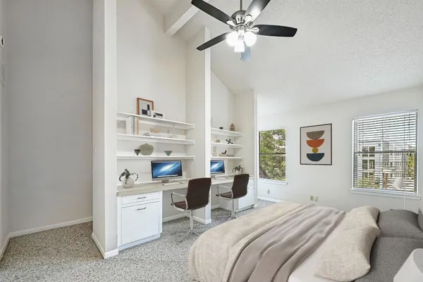 a bedroom with a bed furniture and a window