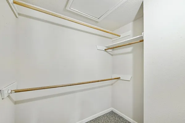 a view of small space with racks on the wall