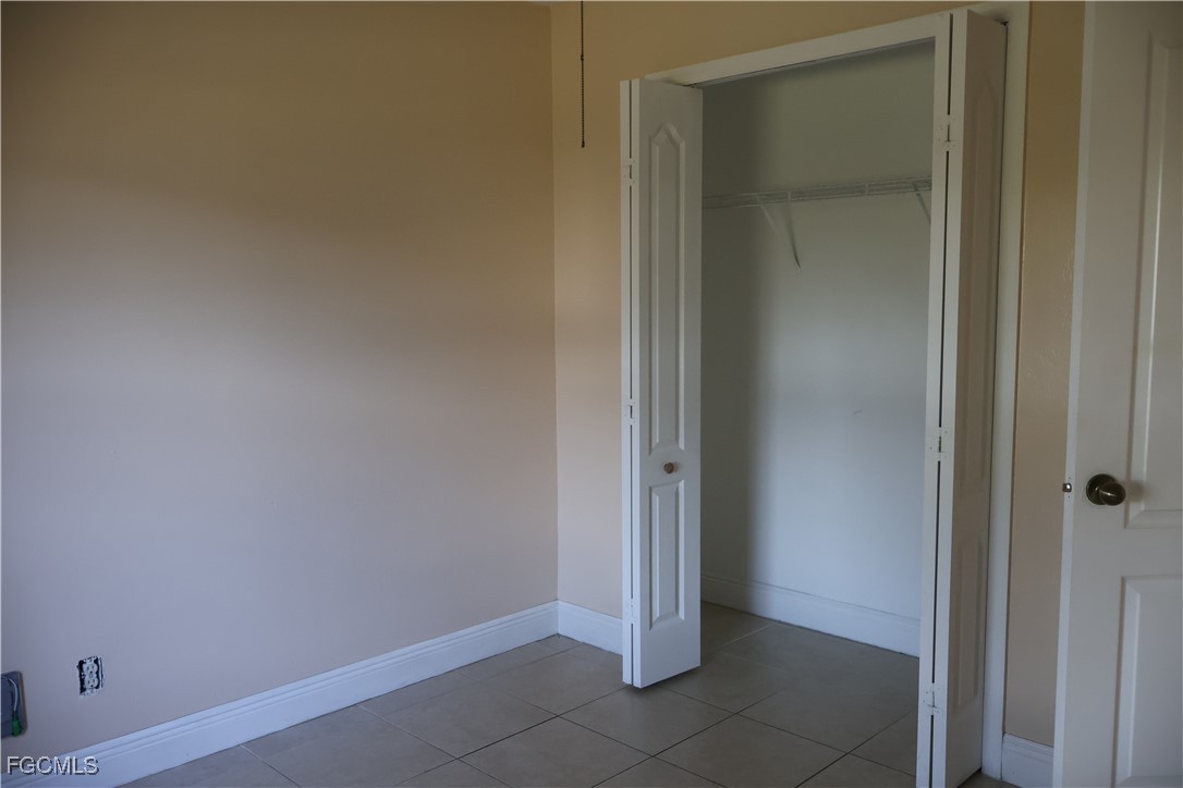 3805 22nd Street Southwest Lehigh Acres, FL 33976 - Photo 19 of 26 a view of an empty room